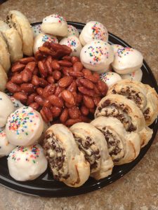 A cookie tray featuring Iced Almond Gems, made with canola oil.