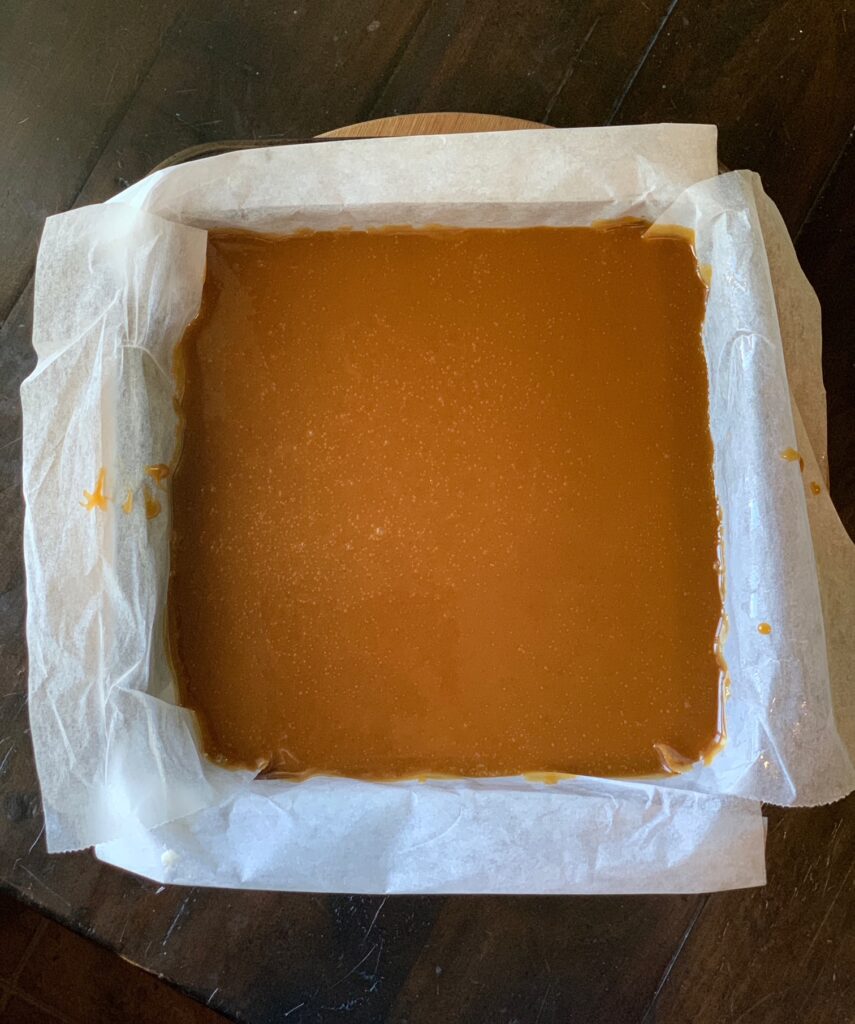 caramel in a pan before cutting